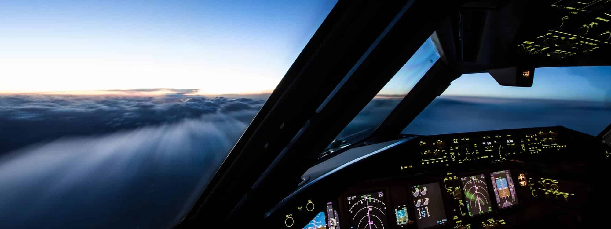 The view from the cockpit of the morning sky above the clouds highlights the importance of attending the Introduction to ISO 9001:2015 Quality Management Systems course.